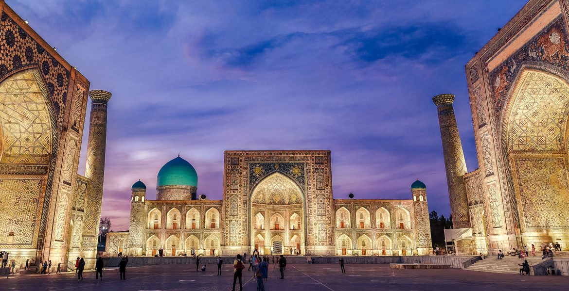 Evening lights at the Registan square in Samarkand, the most famous landmark of Uzbekistan
