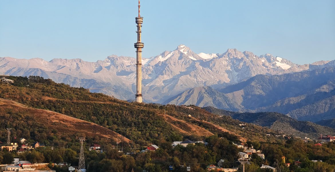 View of the Tien Shan mountains with the TV tower at Kok Tobe in Almaty Kazakhstan