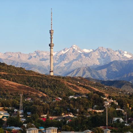 View of the Tien Shan mountains with the TV tower at Kok Tobe in Almaty Kazakhstan
