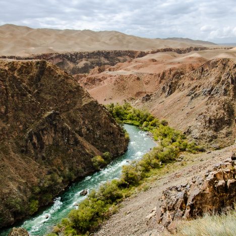 Black Canyon known for its emerald-green river cutting through the towering rock formations in Kazakhstan