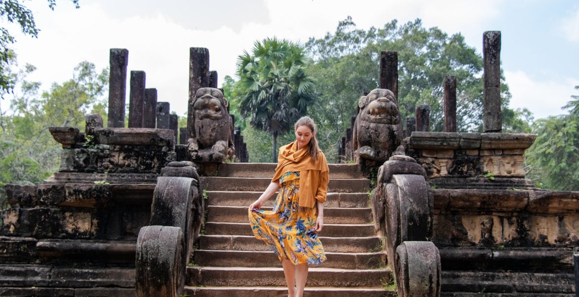 Dressed modestly for visiting temple ruins in Polonnaruwa Sri Lanka